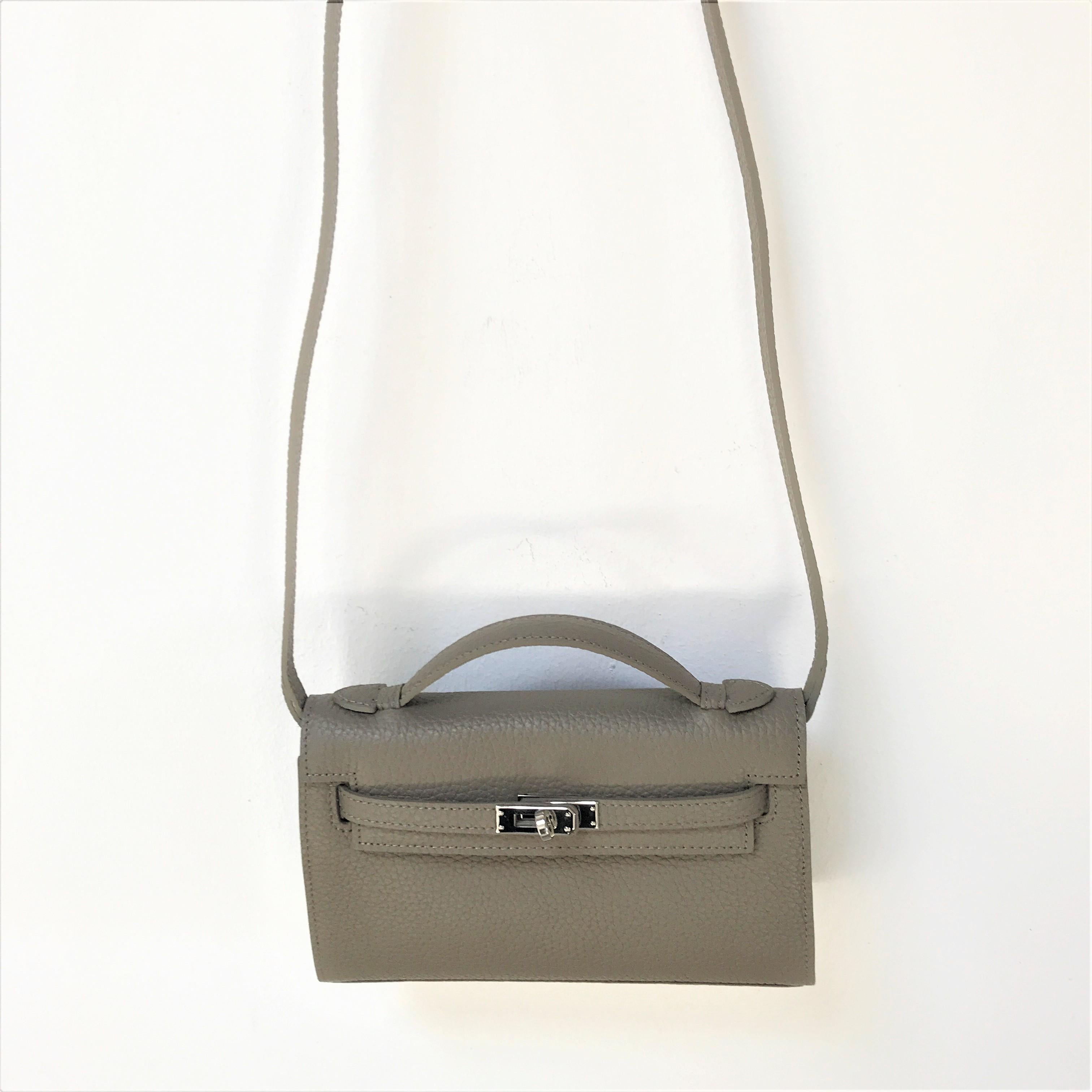 A new Pochette bag taub leather chourcheval with detachable shoulder strap  In New Condition In Stuttgart, DE