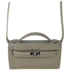 A new Pochette bag taub leather chourcheval with detachable shoulder strap 