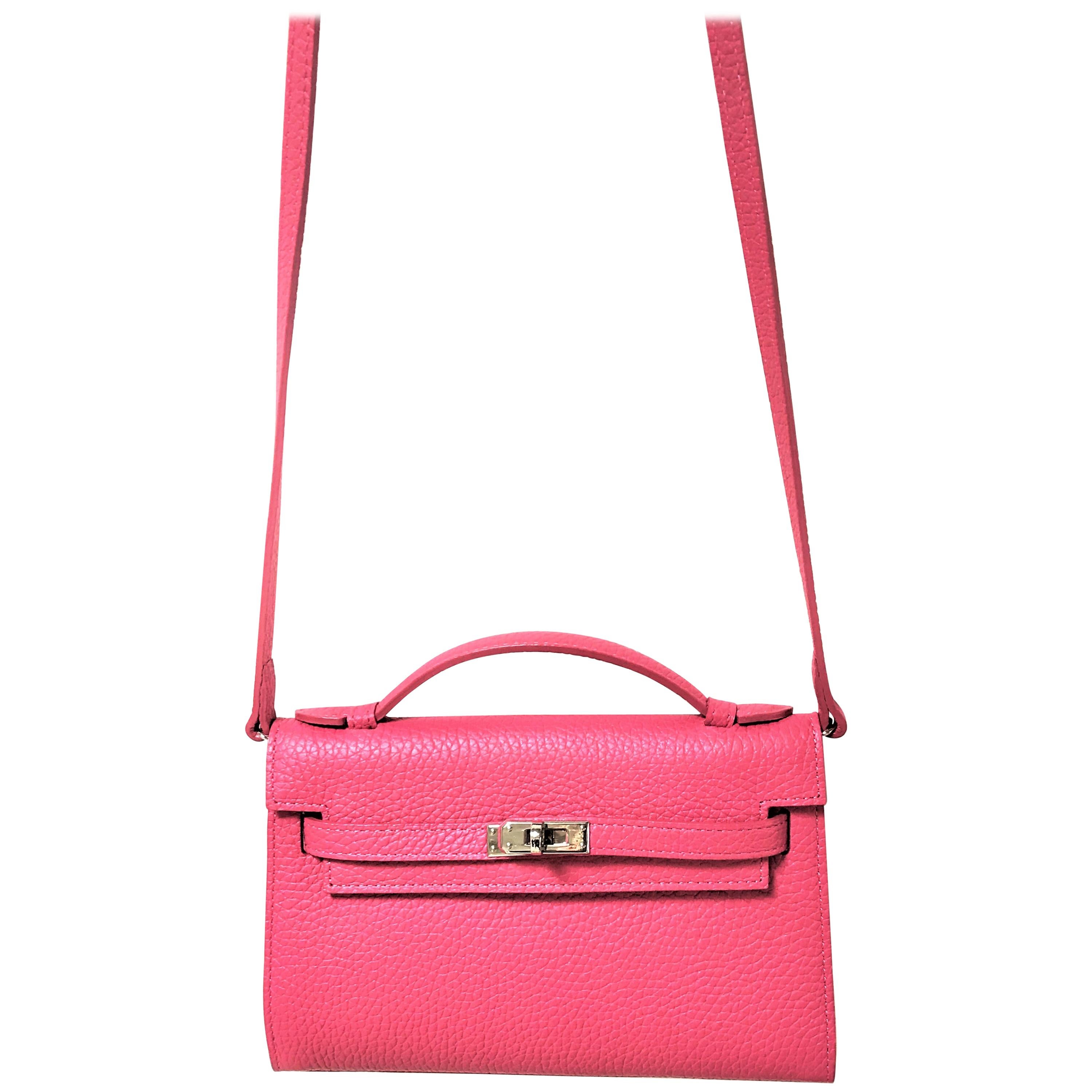 a new Pochette pink leather with shoulder strap 