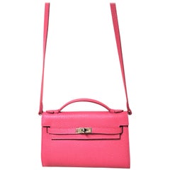 a new Pochette pink leather with shoulder strap
