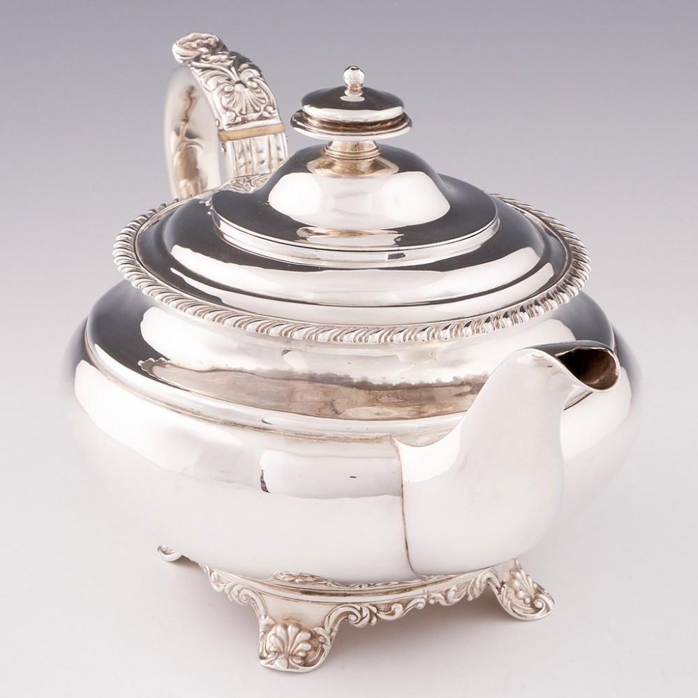 Heading: A newcastle sterling silver teapot
Date: hallmarked in Newcastle 1836 for John Walton
Period: William IV
Origin: Painter Heugh, Newcastle, England
Decoration: Pie crust rim. Four feet with shell and scroll decoration
Size: height