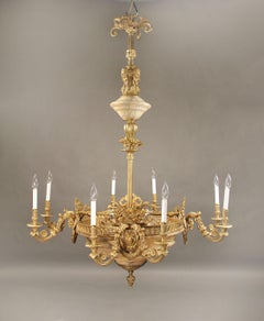 Joli lustre à 16 lumières en bronze doré et albâtre de la fin du XIXe siècle