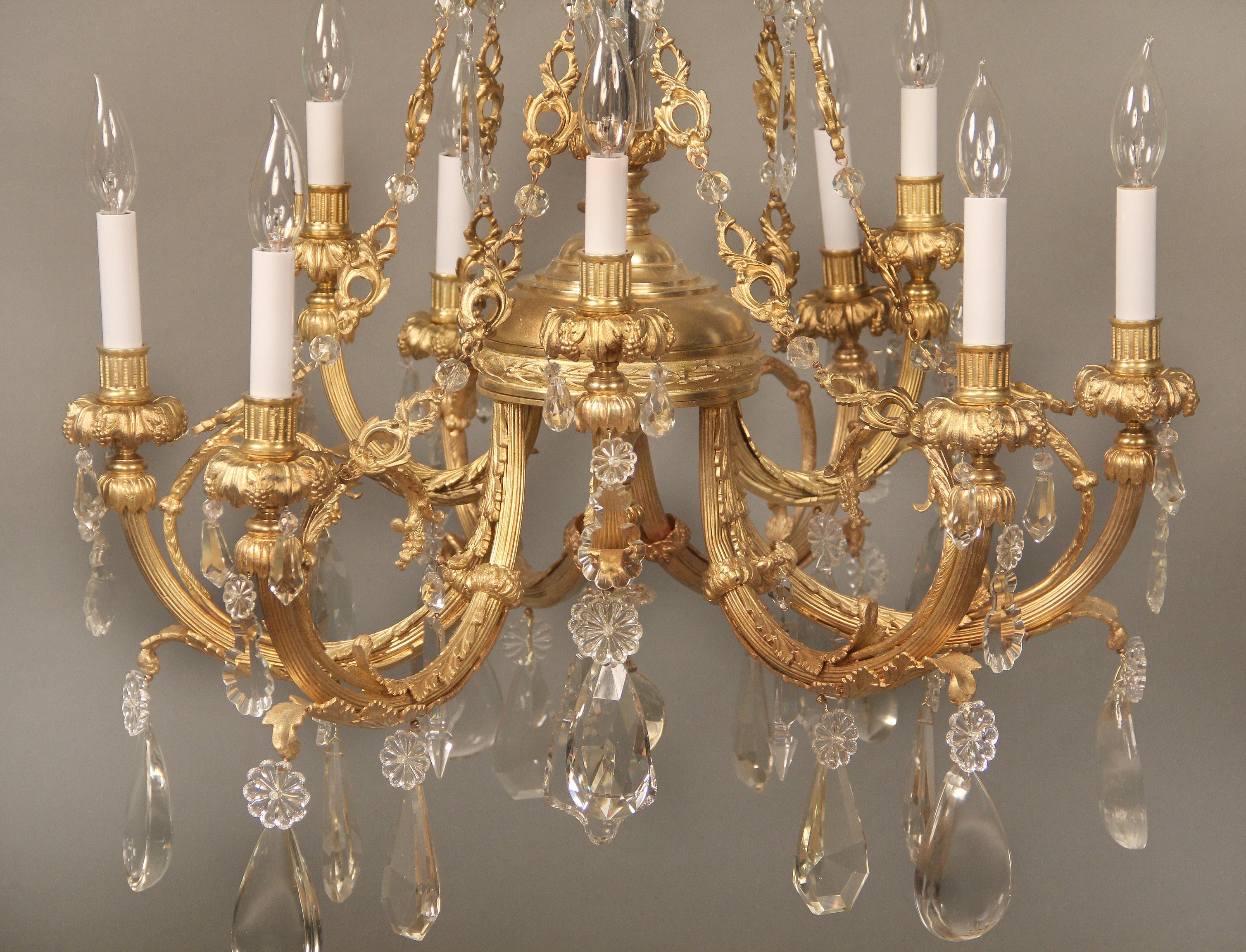 French Nice Late 19th Century Gilt Bronze and Crystal Nine Light Chandelier For Sale