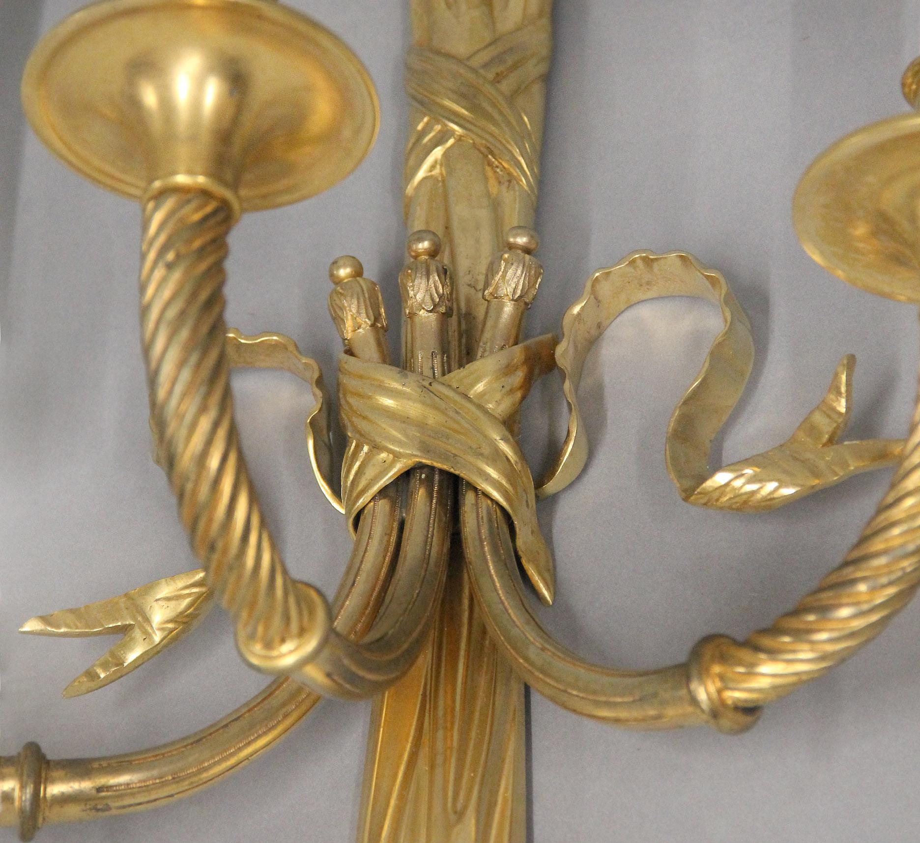 French A Nice Pair of Early 20th Century Gilt Bronze Three Light Sconces For Sale
