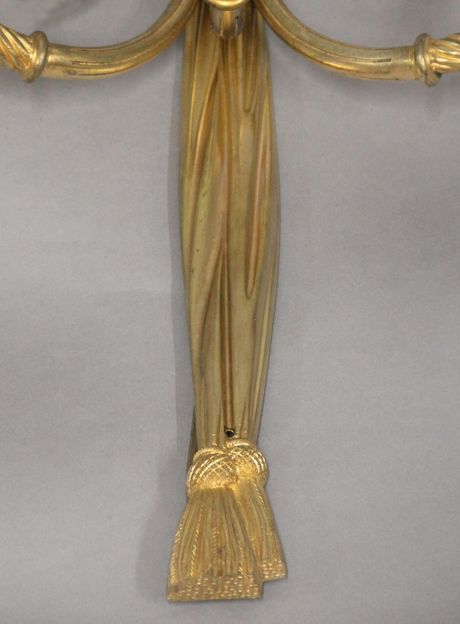 A Nice Pair of Early 20th Century Gilt Bronze Three Light Sconces In Good Condition For Sale In Long Island City, NY