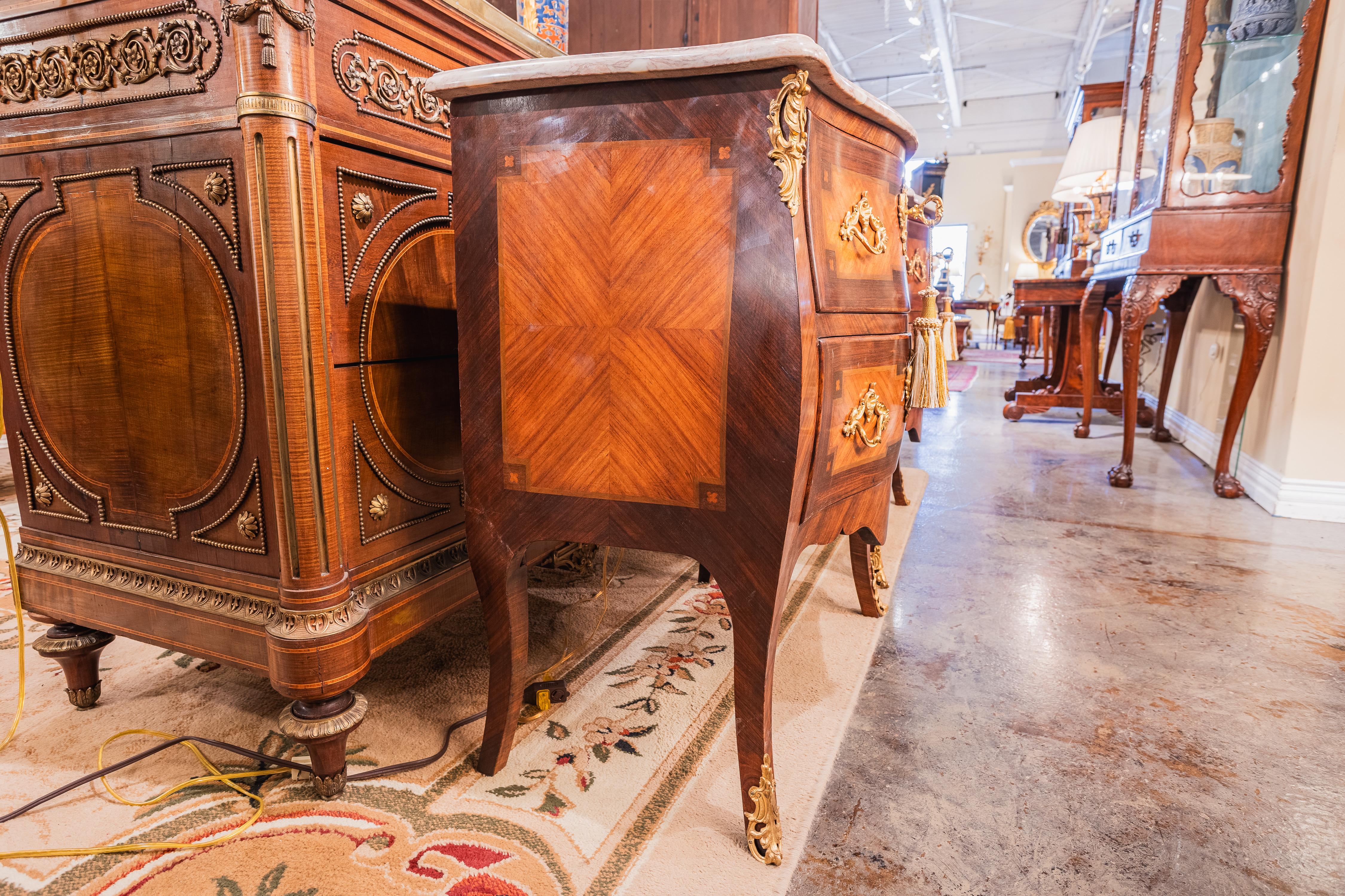 A nice pair of French 19th century Louis XVI mahogany and inlayed nightstand commodes . Gilt bronze mounts and marble tops. Excellent condition 
