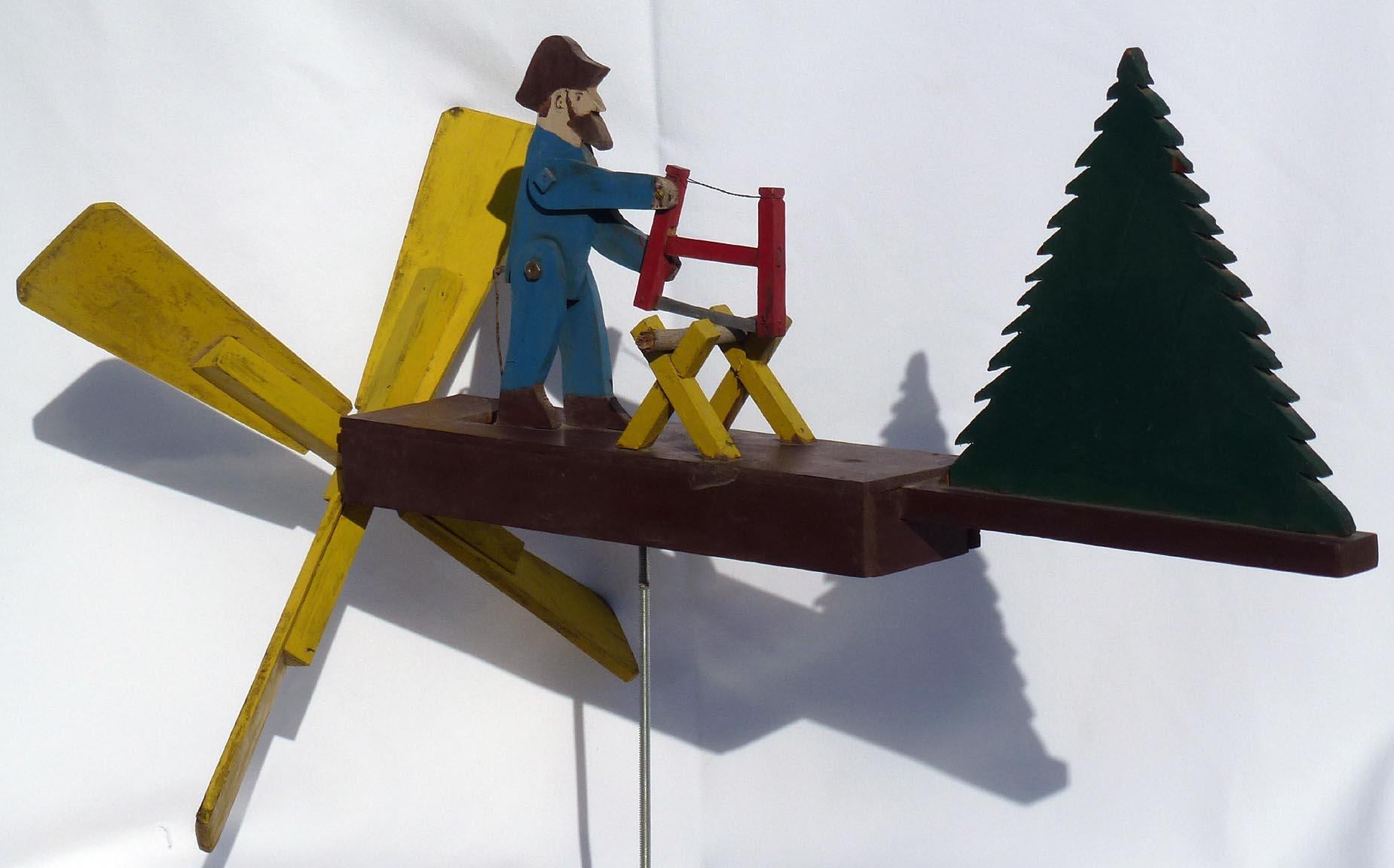 man sawing wood whirligig