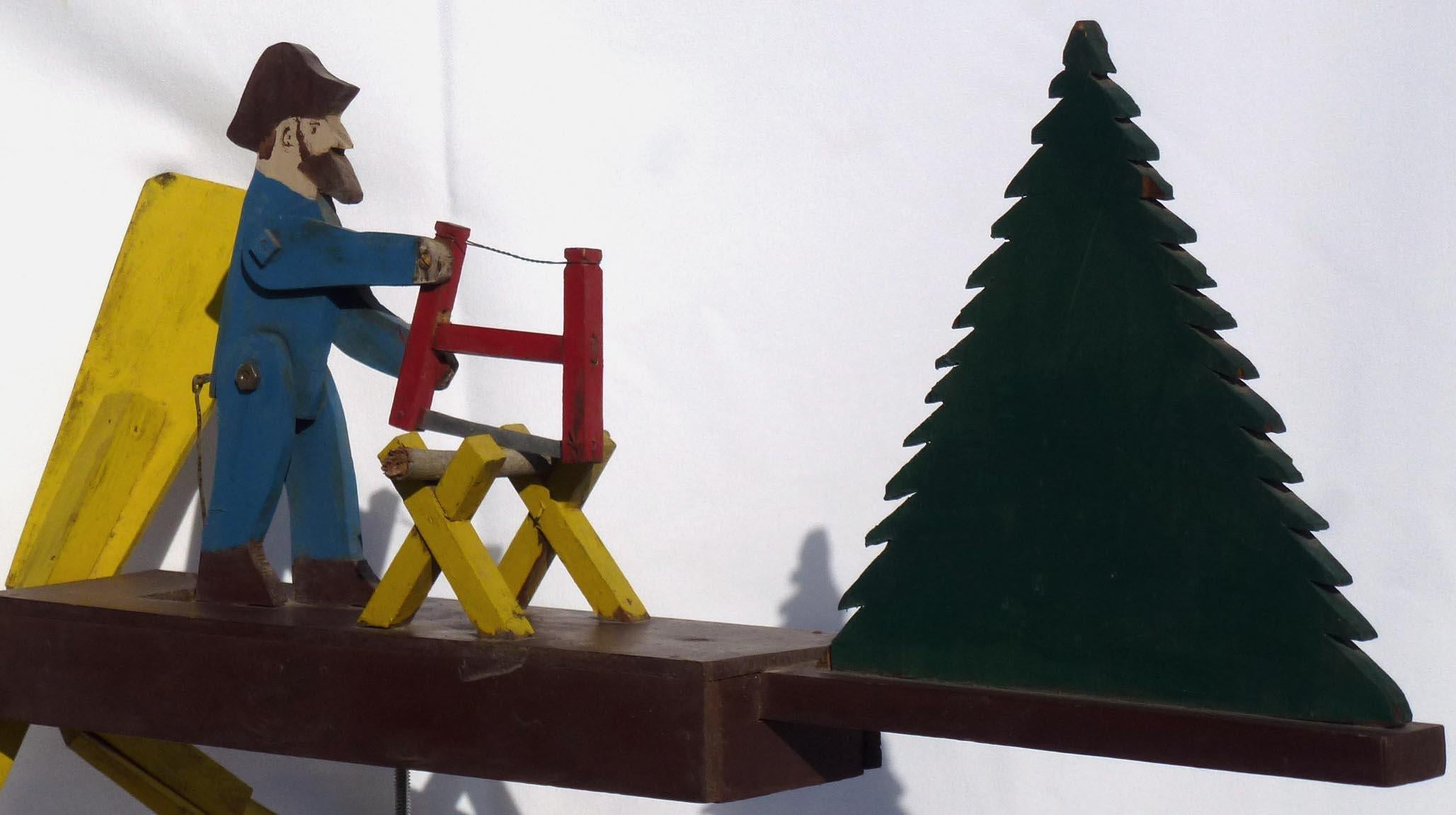 man chopping wood whirligig
