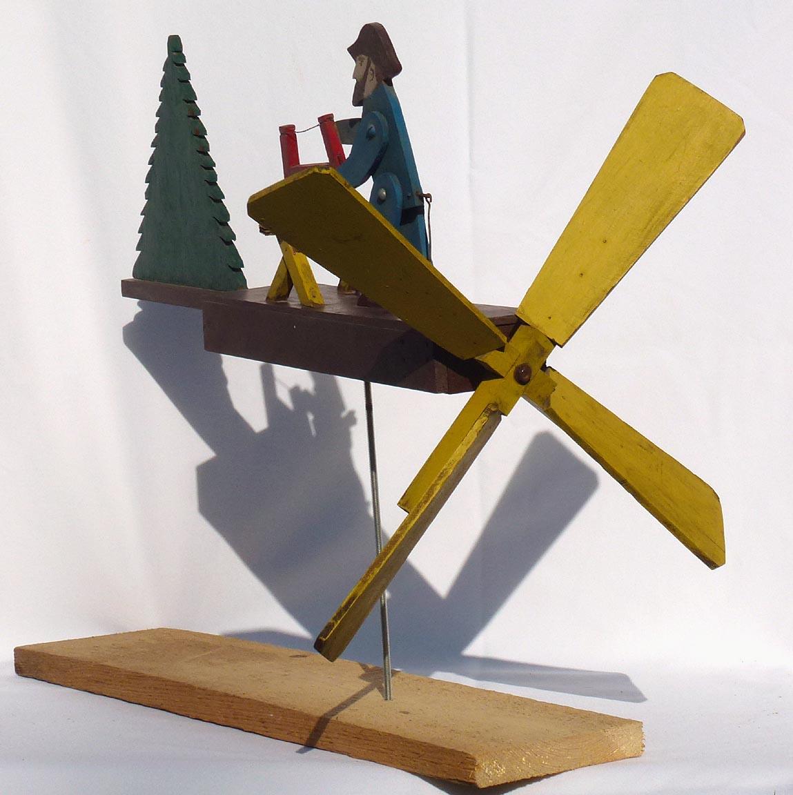 Hand-Crafted Nicely Painted Whirligig of a Bearded Man Sawing Wood, 2nd Half 20th Century For Sale