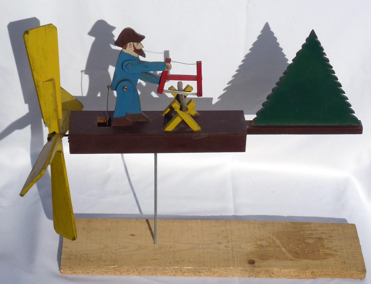 Late 20th Century Nicely Painted Whirligig of a Bearded Man Sawing Wood, 2nd Half 20th Century For Sale