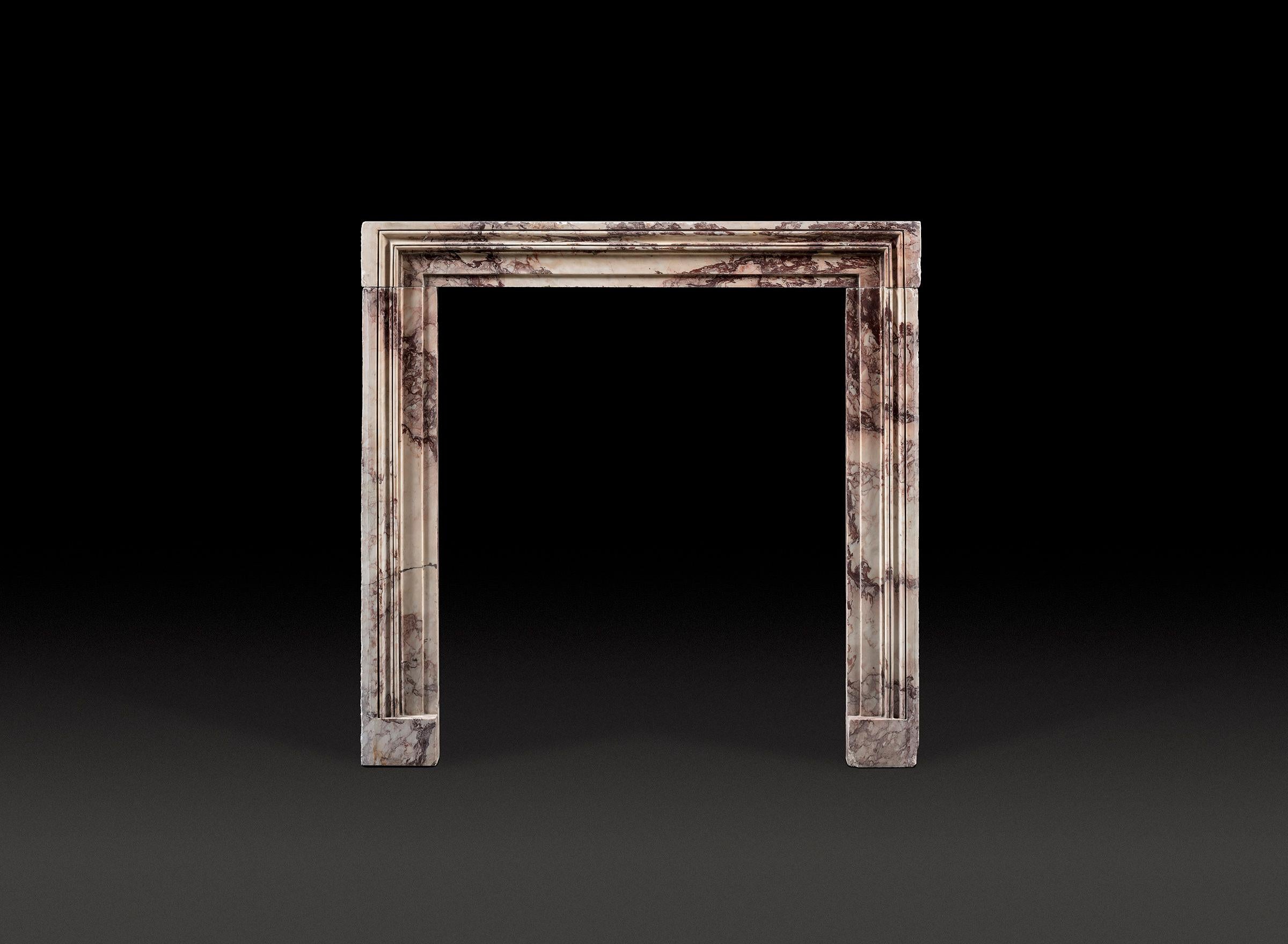 A Nineteenth Century Calacatta Viola Frame Chimneypiece of Modest, yet Good Proportions

The marble is well figured with plumes of dark red standing against a ground of white marble.

Measurements: 
Height 48in (122cm) width 49¼in (125cm)
Internal
