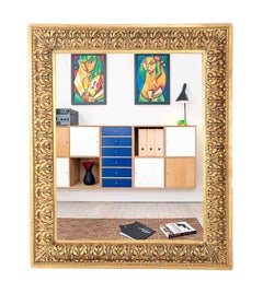 A Nineteenth Century continental relief and gilt carved mirror.