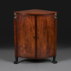 A Nineteenth Century Empire Corner Cupboard