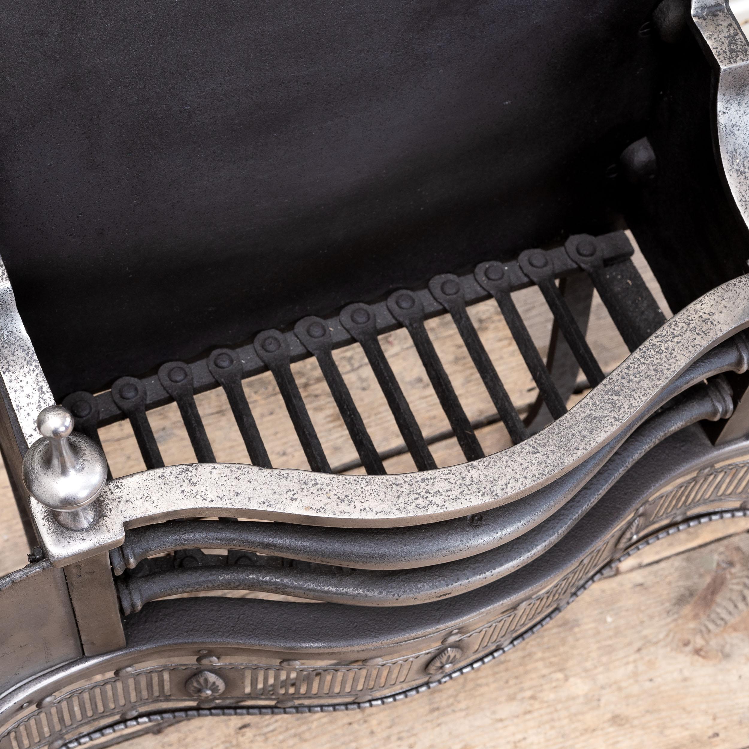 A Nineteenth Century Engraved Steel and Iron Fire Grate For Sale 3
