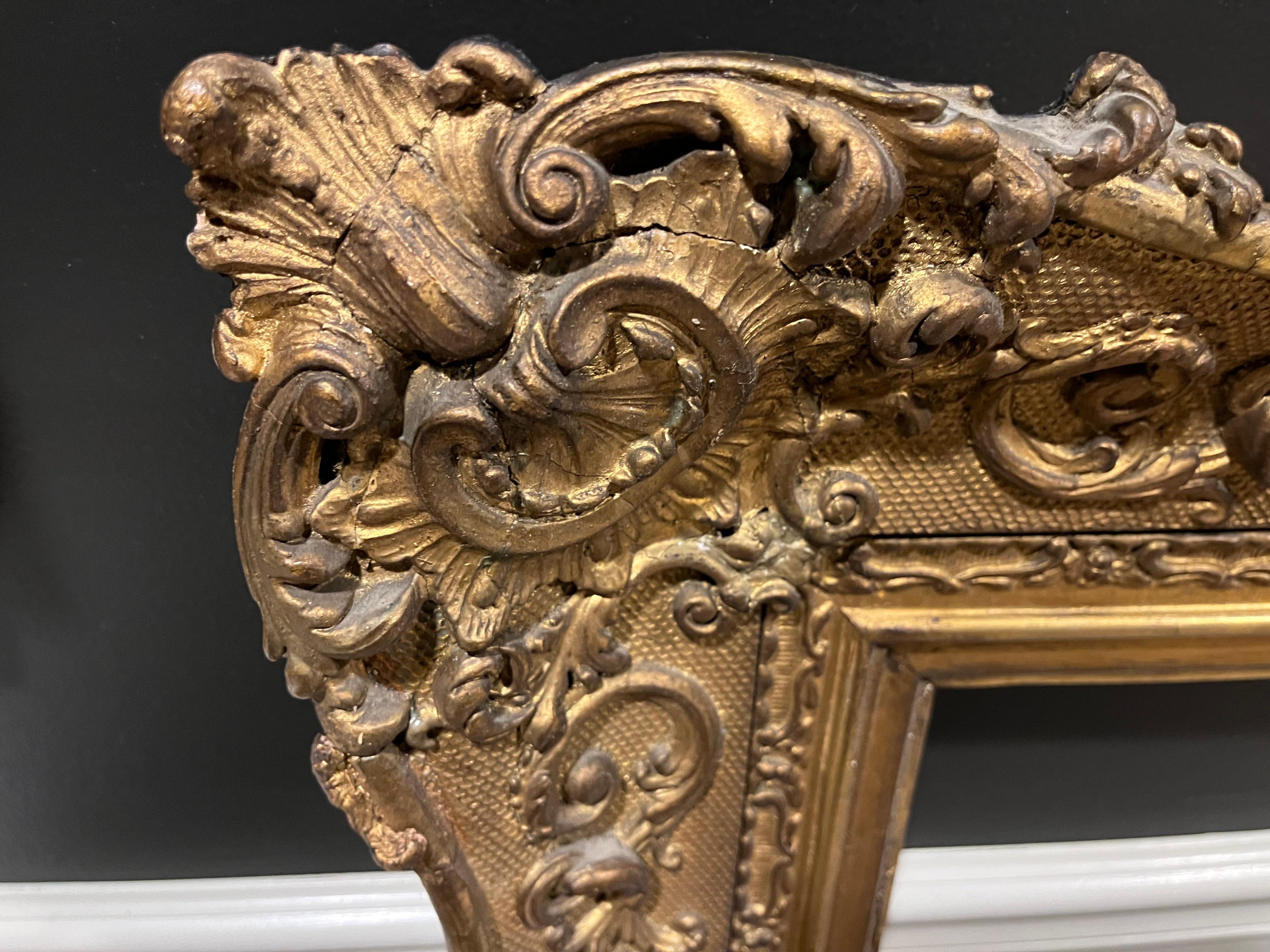French Nineteenth Century European Gilt Wood Frame, Having Festoons and C Scrolls For Sale