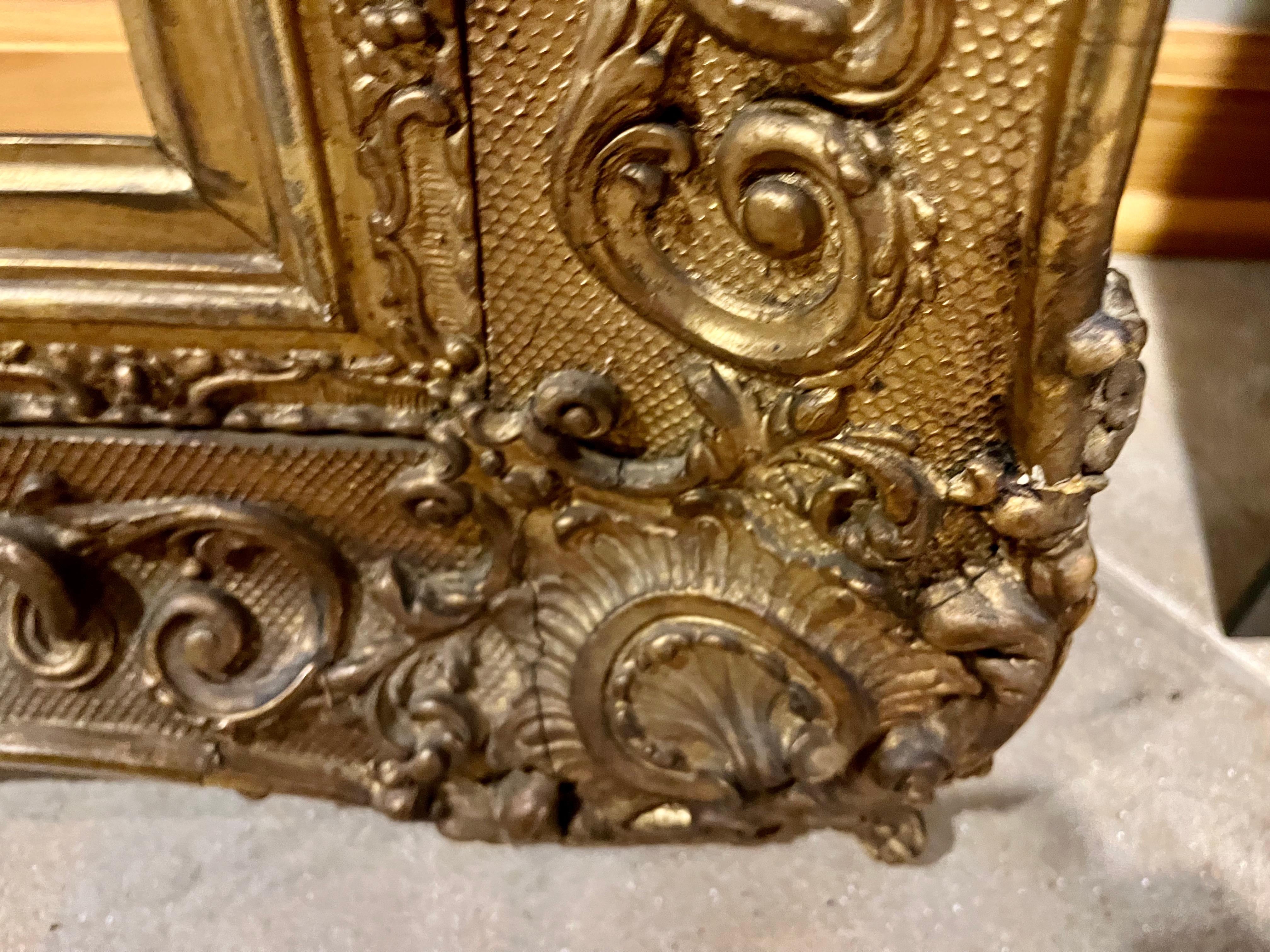 Gesso Nineteenth Century European Gilt Wood Frame, Having Festoons and C Scrolls For Sale