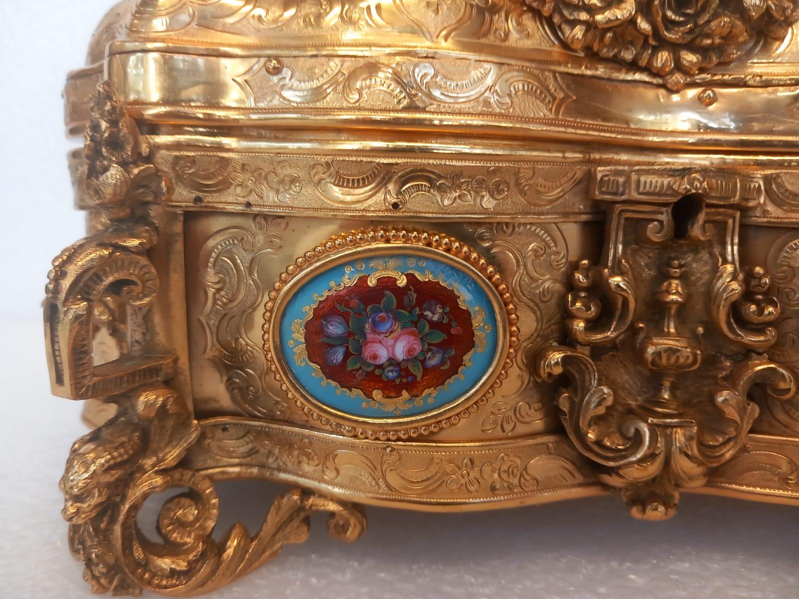 A nineteenth century French ormolu casket, in the medieval style, with a cherub For Sale 3