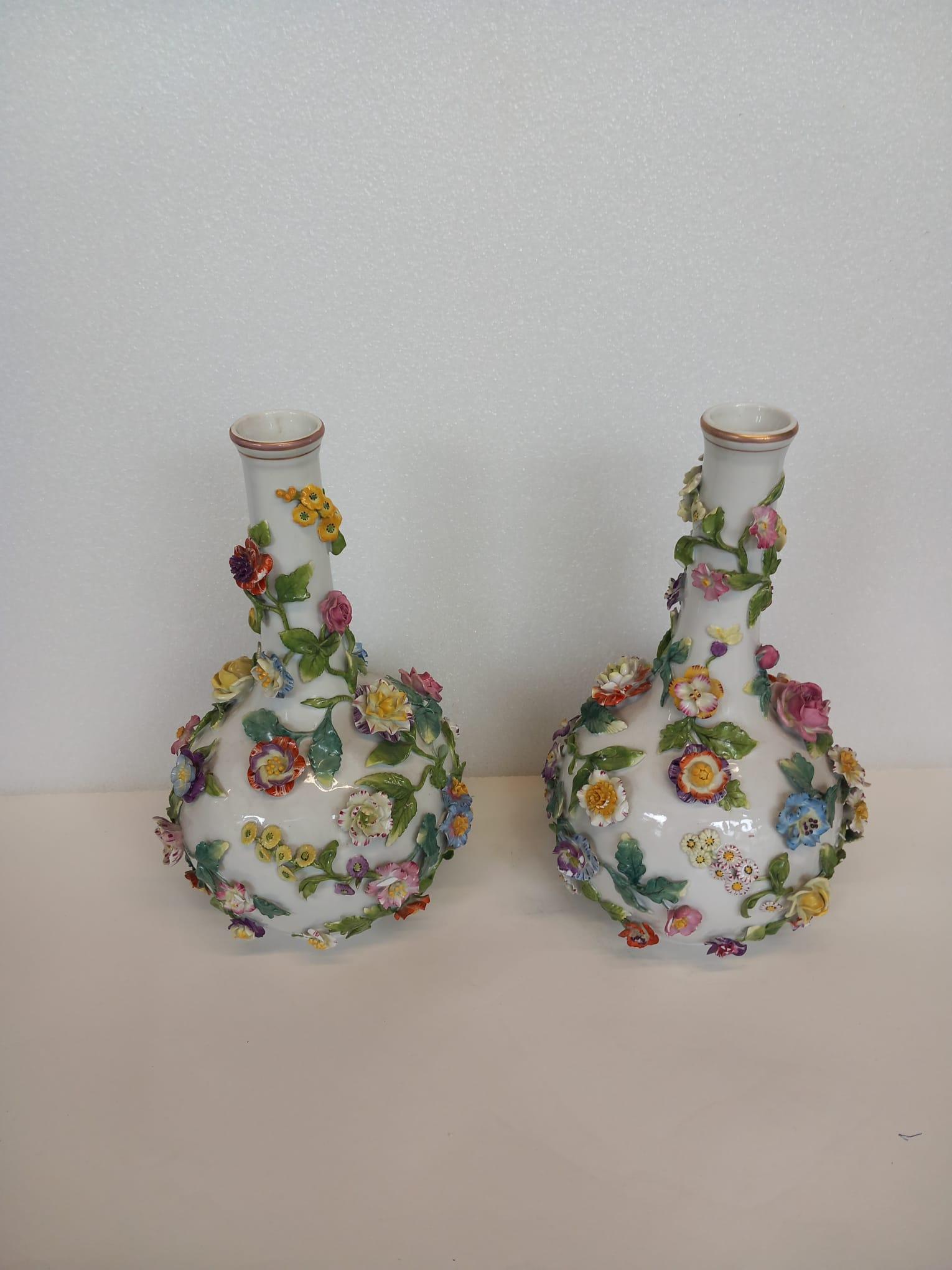 A nineteenth century pair of Dresden white porcelain vases 3