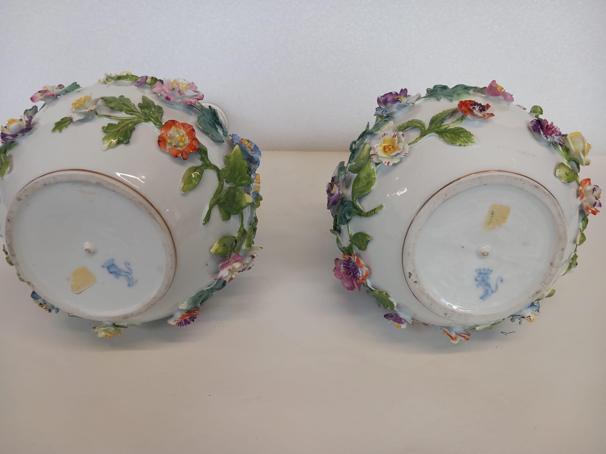 German A nineteenth century pair of Dresden white porcelain vases