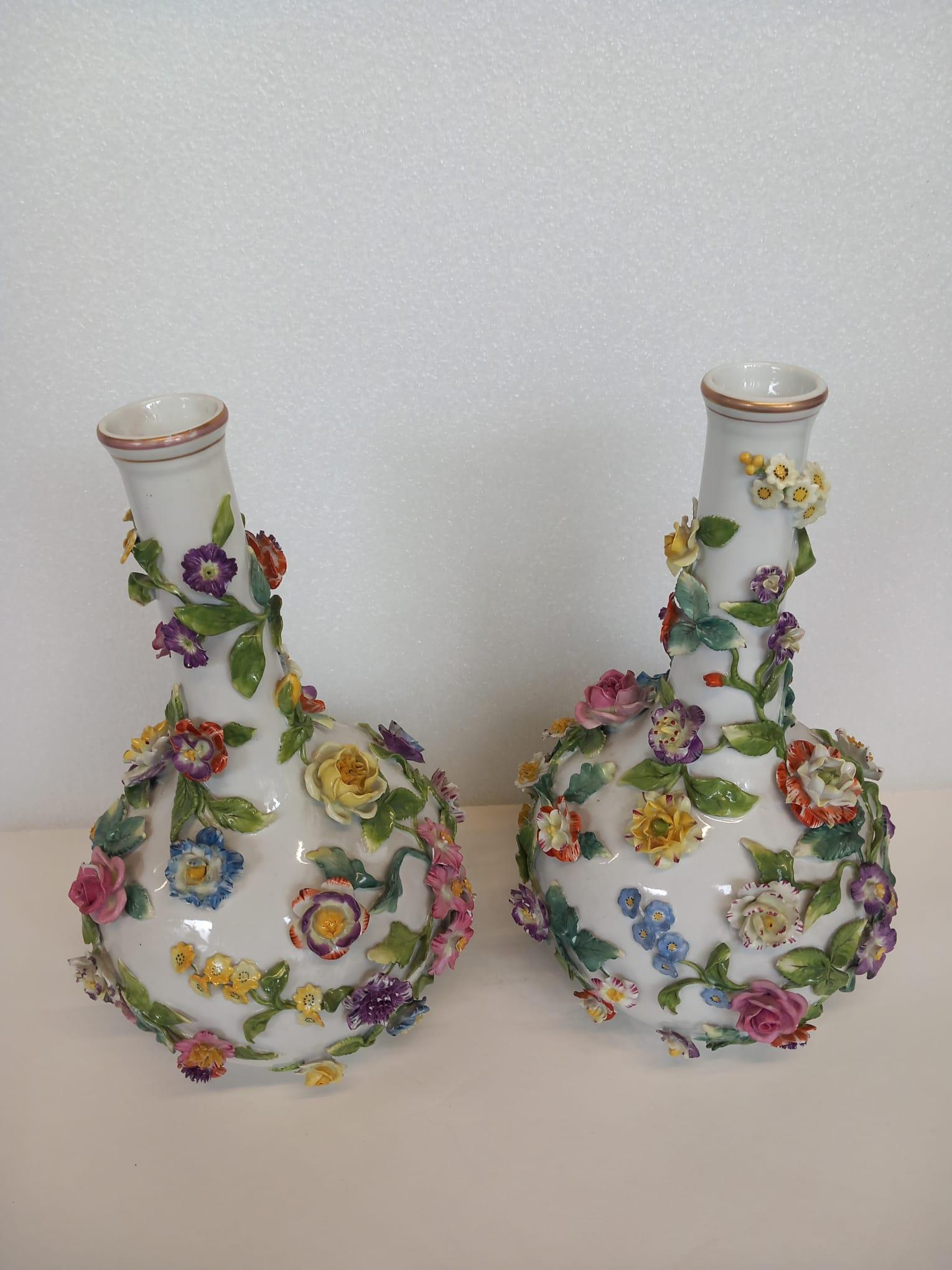 19th Century A nineteenth century pair of Dresden white porcelain vases