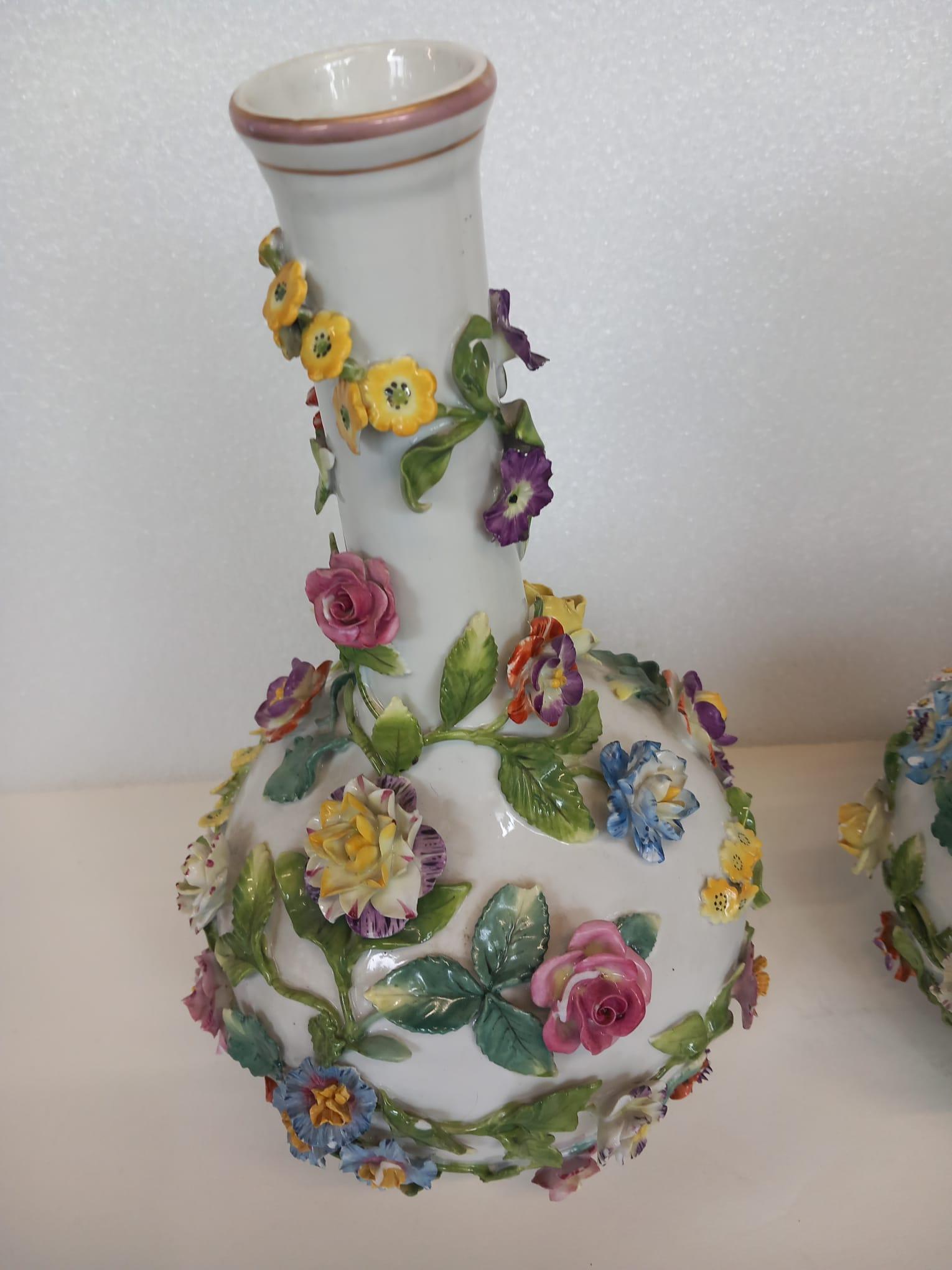 Ceramic A nineteenth century pair of Dresden white porcelain vases