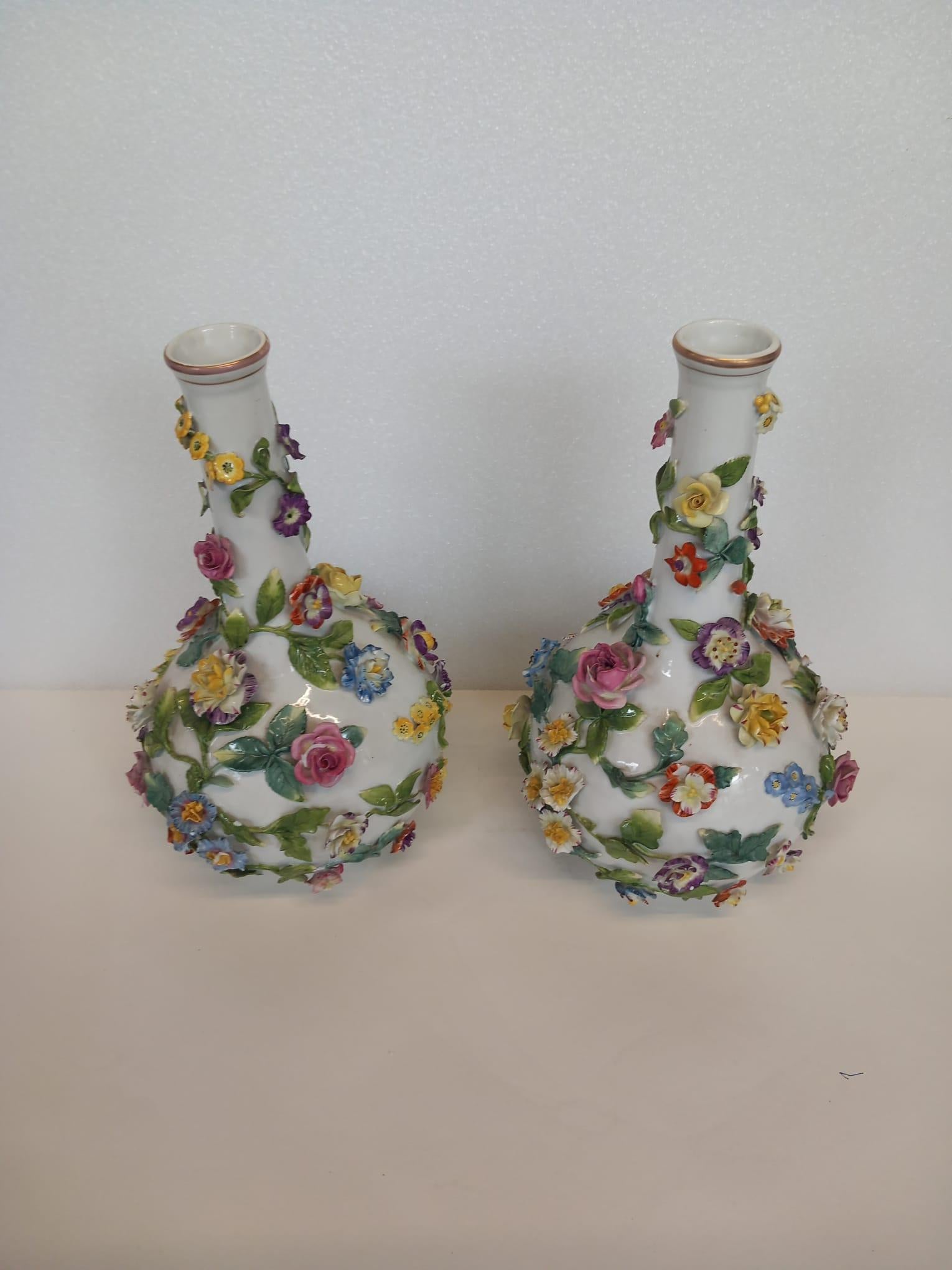 A nineteenth century pair of Dresden white porcelain vases 1