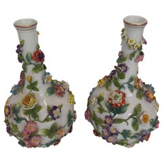 A nineteenth century pair of Dresden white porcelain vases
