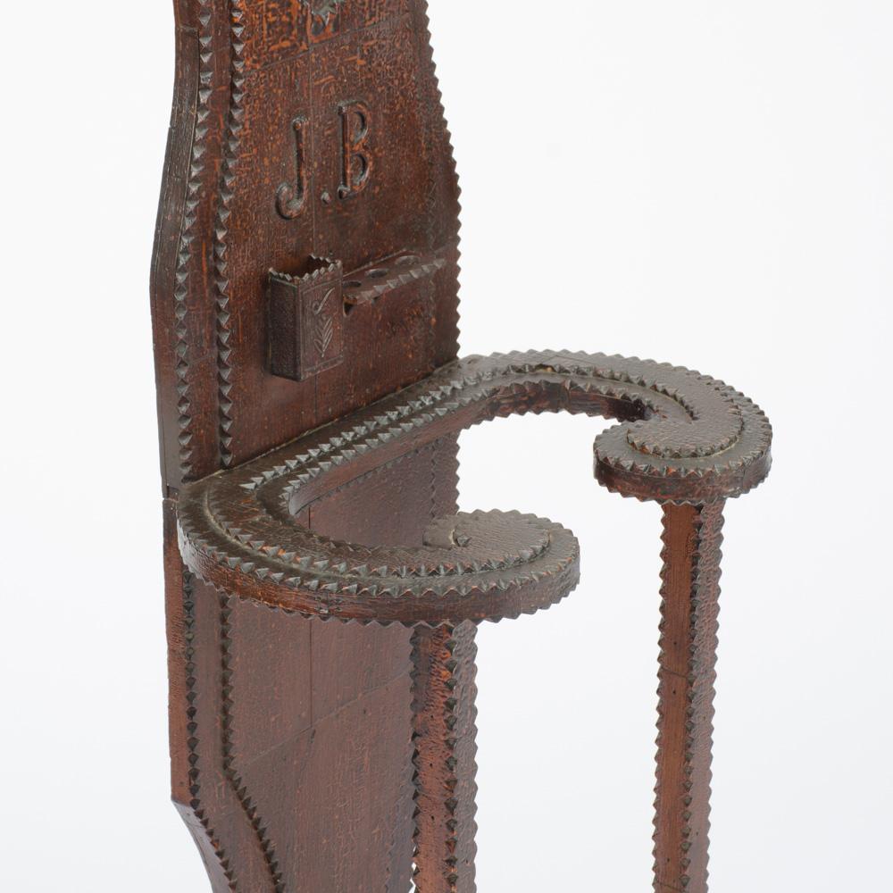 A 19th century American very unique design handcrafted Tramp Art hall tree with pipe holder. J.B carved initials.