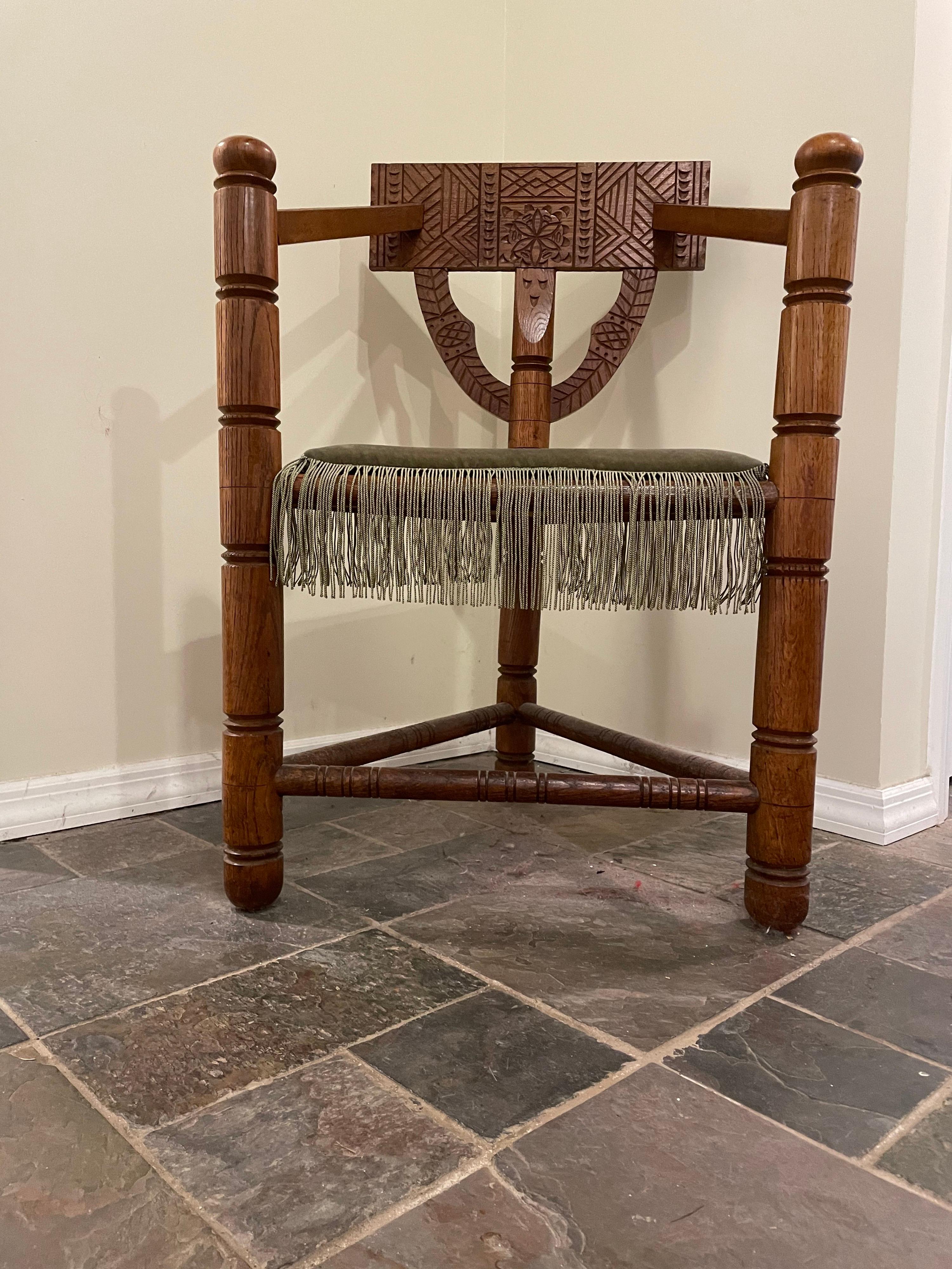 Hand crafted of solid European oak, this unique three legged chair is surprisingly strong and comfortable. This type of chair was carved with ancient 