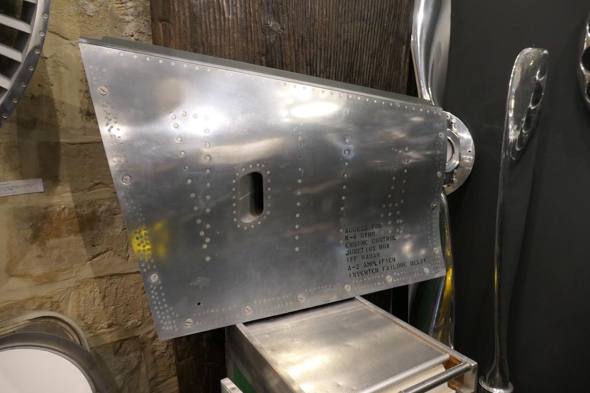 A technical access side panel from a North American F-86 Sabre. First jet with arrow-shaped wings. This panel provided access to the gyroscopes. This is an authentic aircraft’s part making a great art aviation (wall) decoration furniture for your