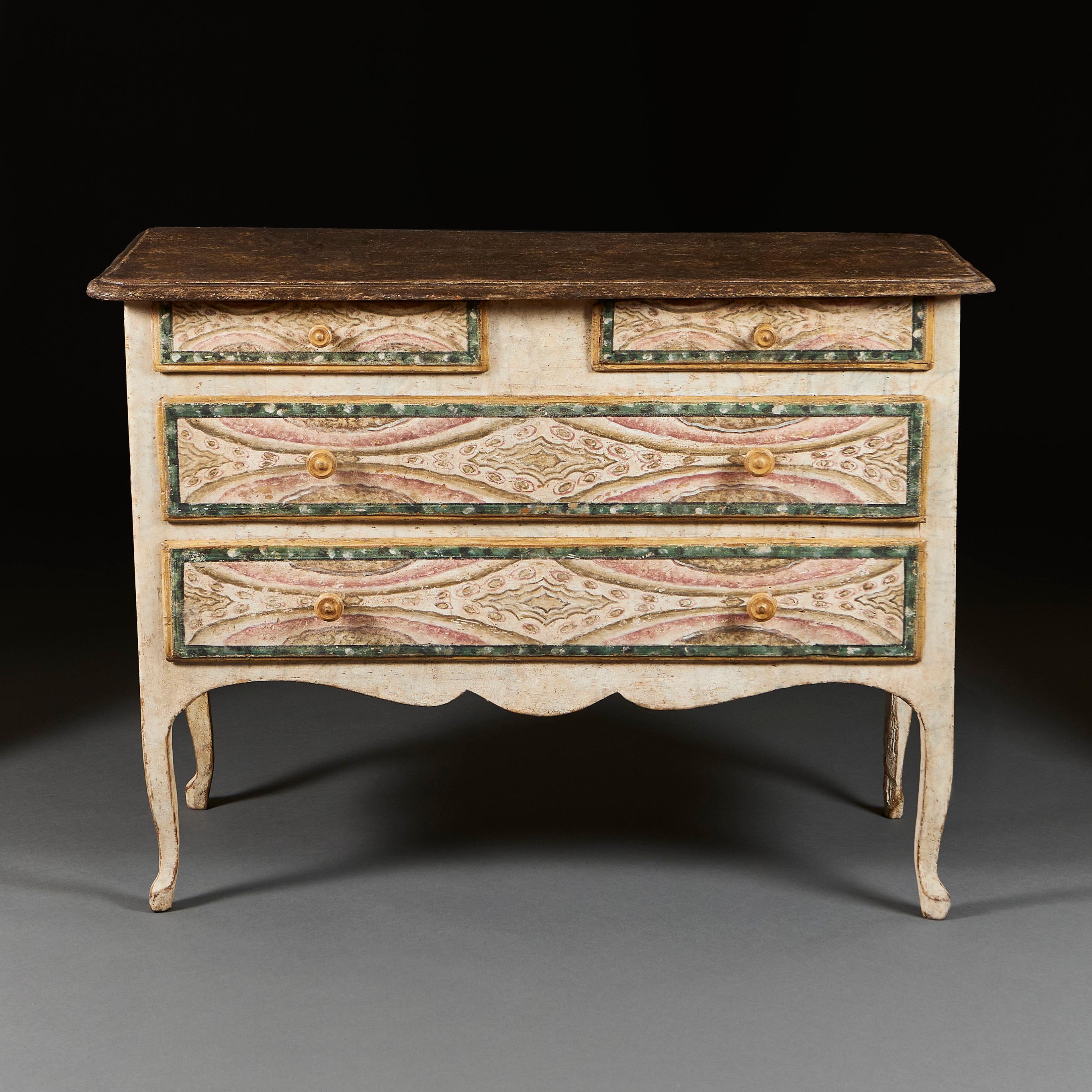 Lombardy, circa 1790

A rare north Italian painted commode, the surfaces simulating various marbles, opening with two short drawers and two long drawers to the front, all supported on cabriole legs.

Measures: Height 85.00cm
Width