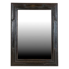 Cadre de miroir ébénisé du nord de l'Italie, de style flamand