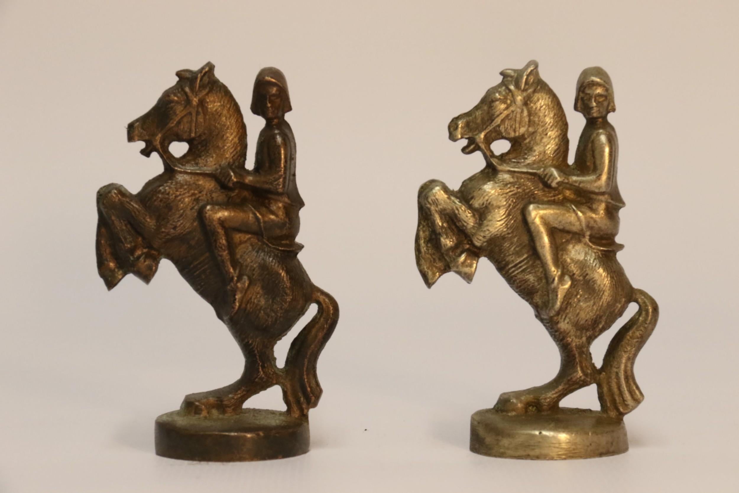 This wonderful novelty chess set is most unusual. It is cast in solid nickel and bronze, the individual pieces are a work of art in their own right. They are cast in the form of medieval figures apart from the castles. The individual pieces are very