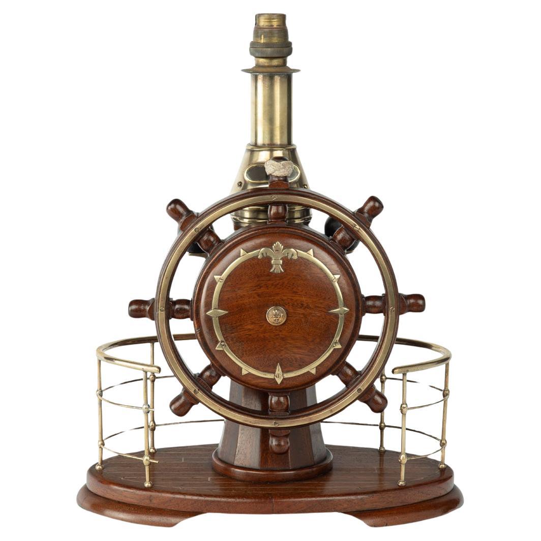 A novelty maritime teak, mahogany and brass table lamp For Sale