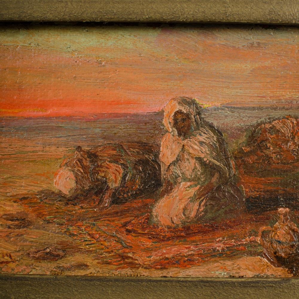 20ième siècle Peinture à l'huile sur panneau représentant des Bédouins sur la plage au coucher du soleil, signée de façon indistincte. en vente