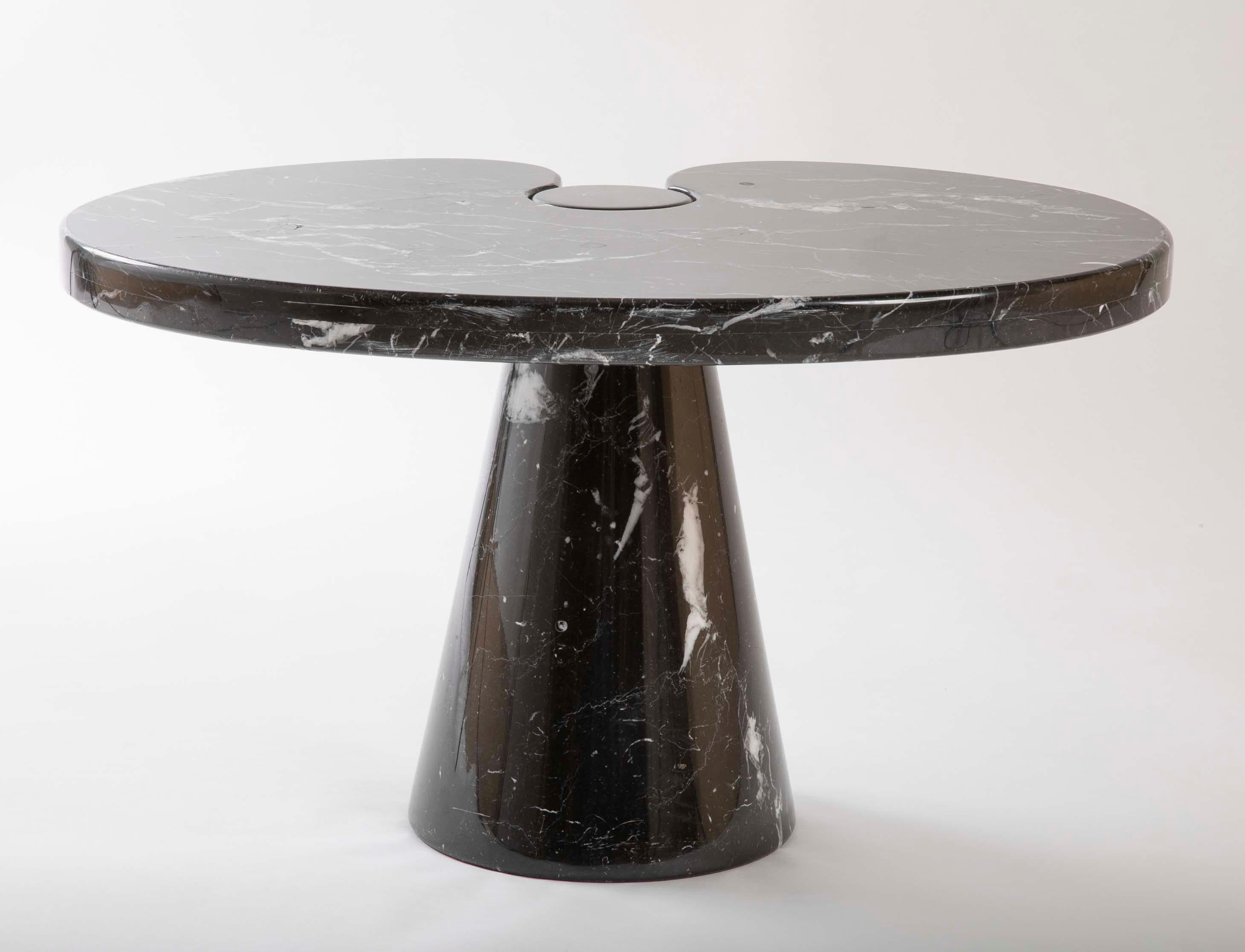 A side table designed by Angelo Mangiarotti in Nero Marquina marble. Organic form.
