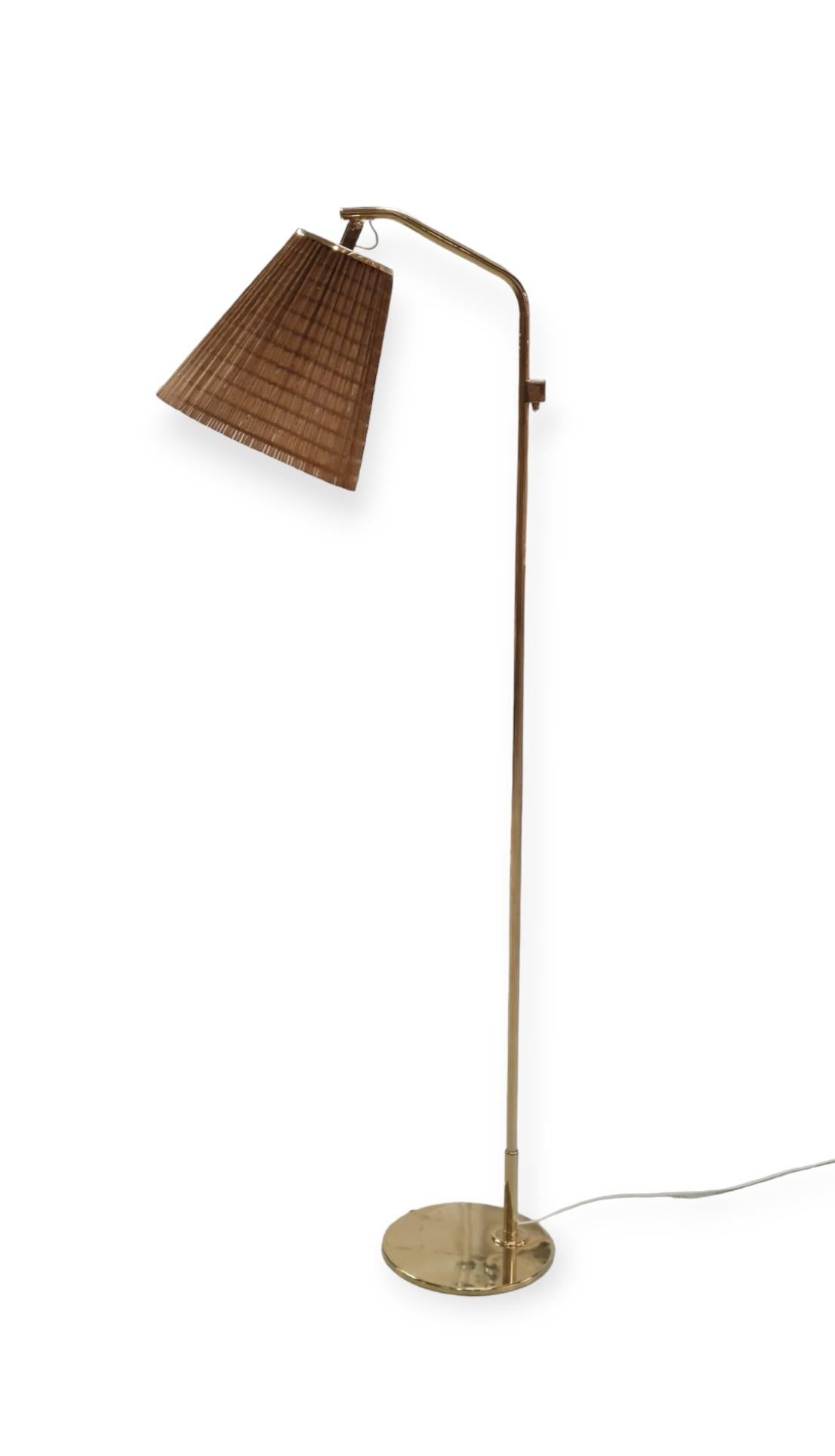 A Paavo Tynell Floor Lamp Model 9613 with Rattan Shade For Sale 5