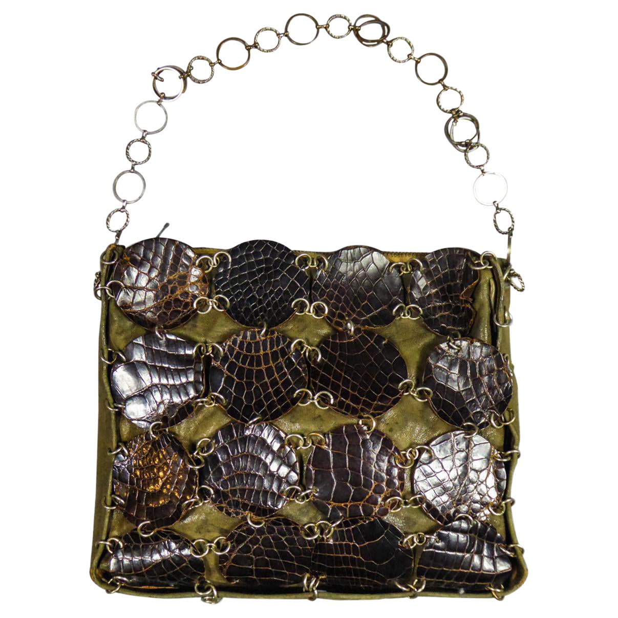 Una pochette da sera di Paco Rabanne in pelle e pad color kaki, circa 1968 in vendita