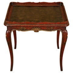 A Painted and Parcel Gilt Tray Top Table