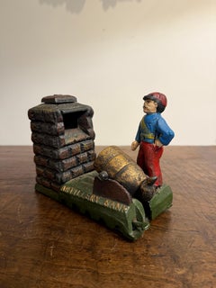 A Painted Cast Iron Artillery Bank Mechanical Bank Money Box, Early 20th Century