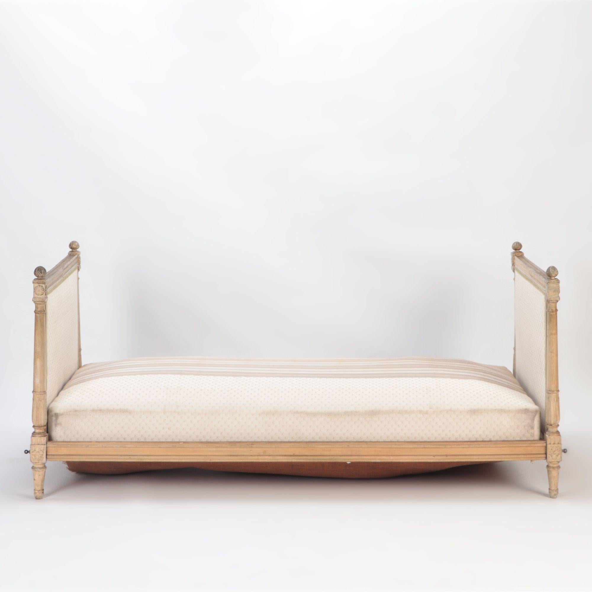 A Painted French Directoire style daybed with cushions C 1910.
Interior dimensions: 31