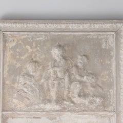A painted French wall panel with plaster relief having three cherubs circa 1900.