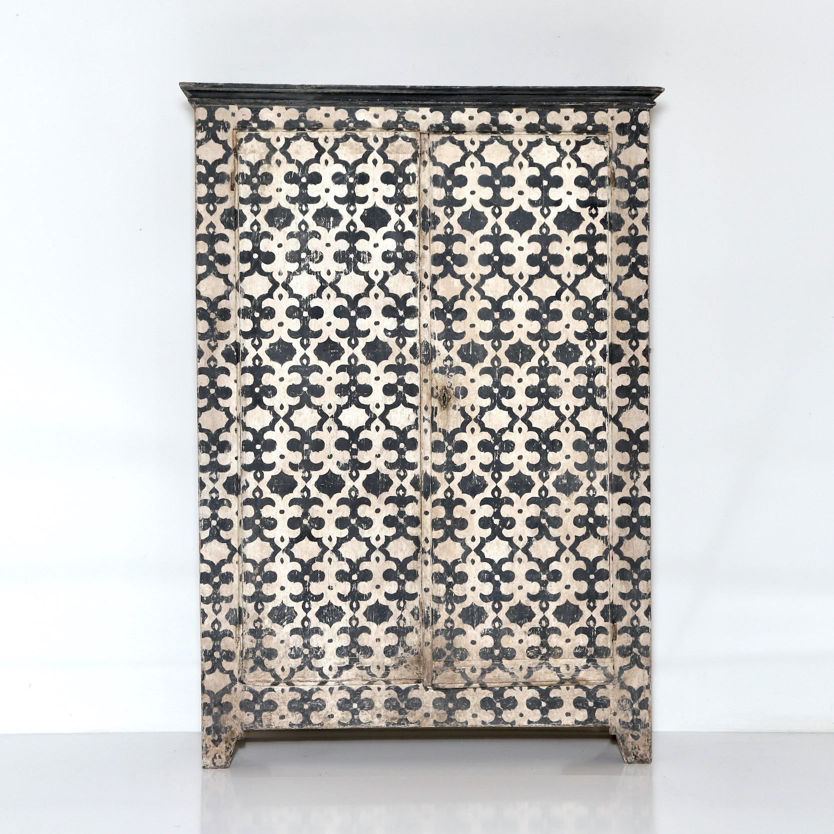 A painted geometric cabinet

Italy, circa 1840 and later

” A stunning geometric painted 2 door cabinet, hand finished in Florence in a traditional Florentine pattern ” 