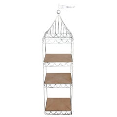 A Painted Metal Plant Stand with Three Shelves