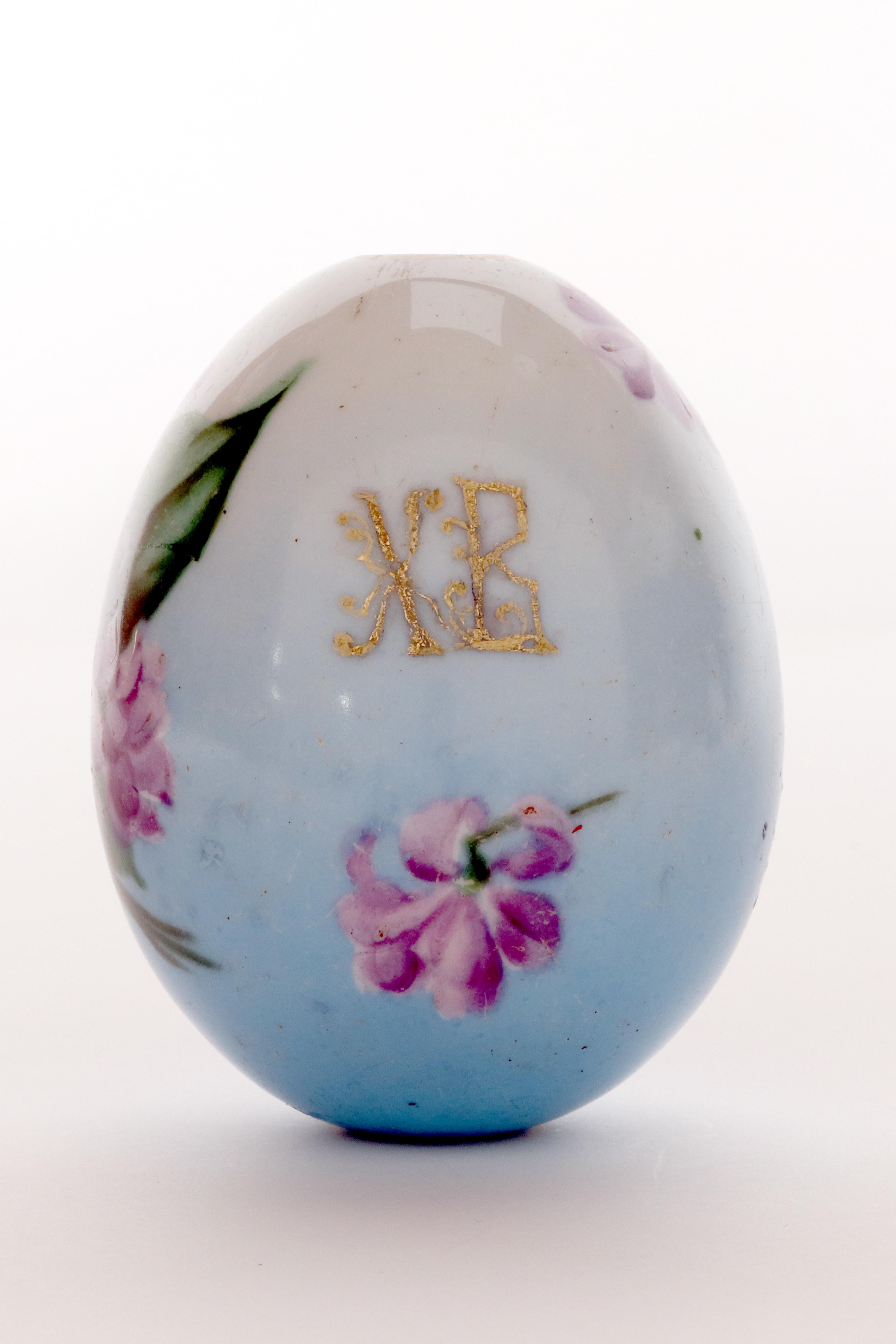 Russian A painted porcelain Easter egg depicting a bunch of Violet flowers, Russia 1890. For Sale