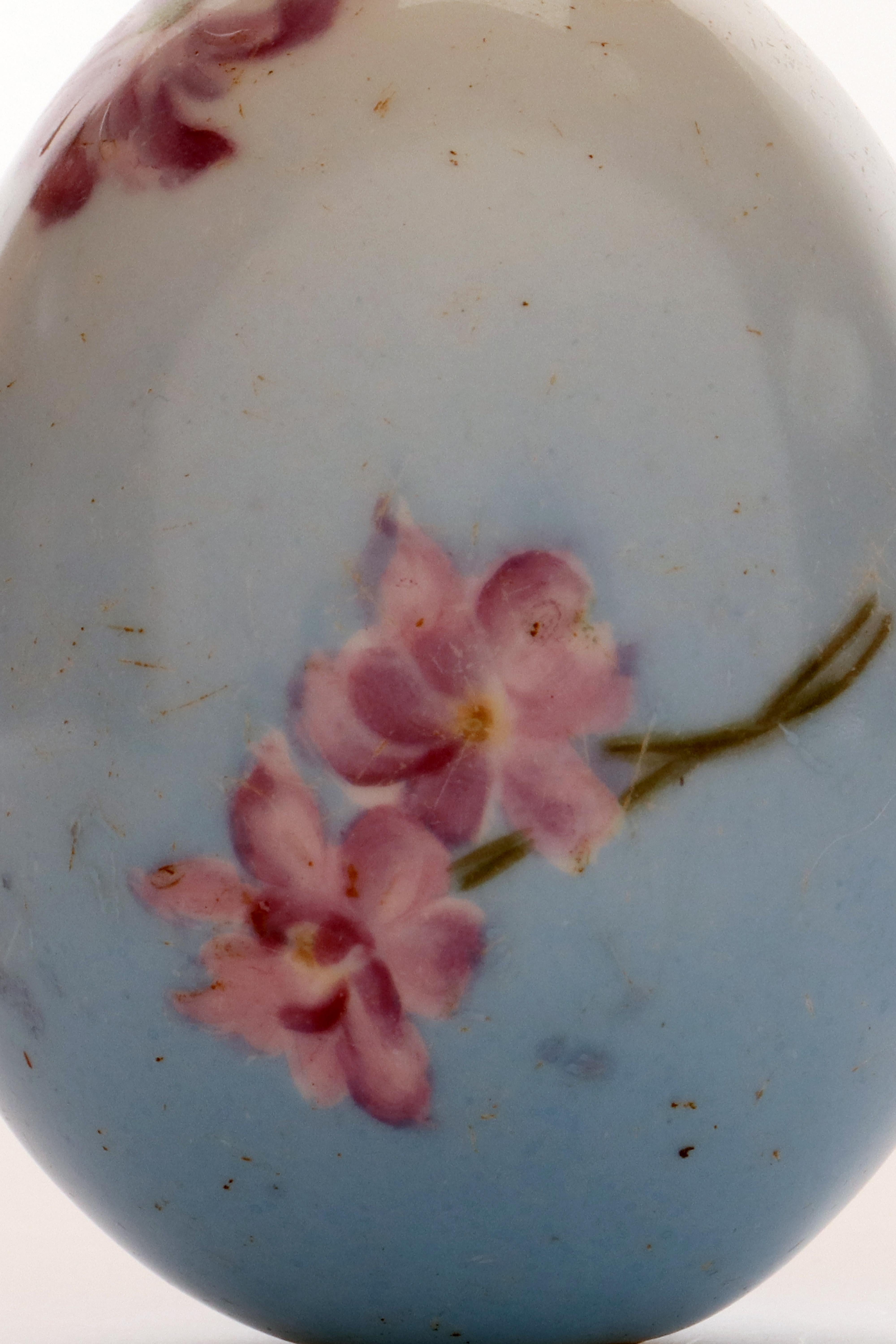 Porcelain A painted porcelain Easter egg depicting a bunch of Violet flowers, Russia 1890. For Sale