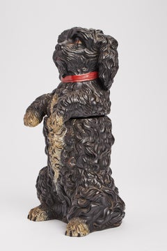A painted terracotta tobacco holder depicting a poodle dog, Austria 1880.