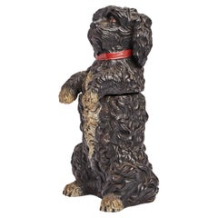 A painted terracotta tobacco holder depicting a poodle dog, Austria 1880. 