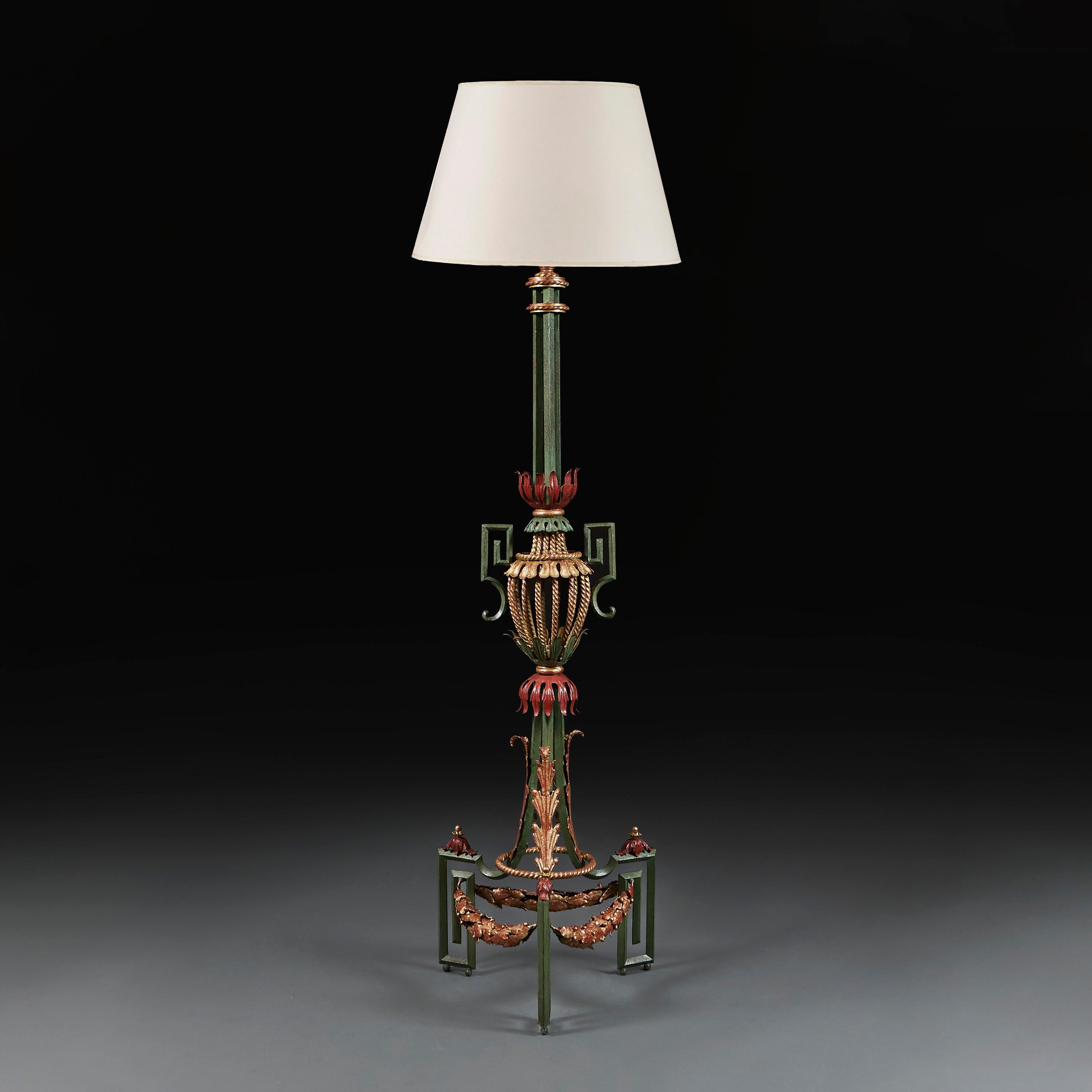 France, circa 1940

A striking mid-century painted wrought iron floor lamp after Gilbert Poillerat with a central stylized urn, Greek keys motifs, trailing gold acanthus leaves and stretchers in the form of berried garlands.

Height