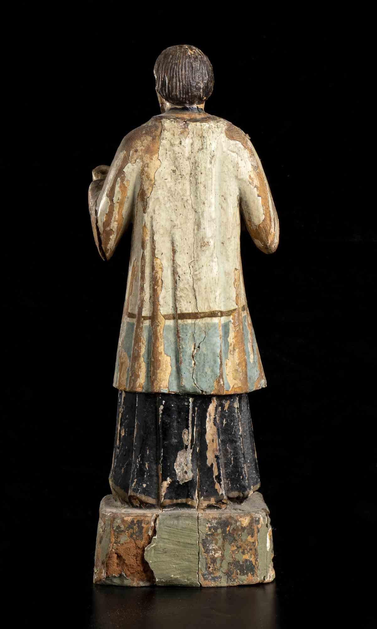 Indo-Portuguese, 18th-19th century

The figure standing on a square section base, both arms raised (one missing the forearm), wearing a full robe, the face with beard.

Provenance: Italian private collection.